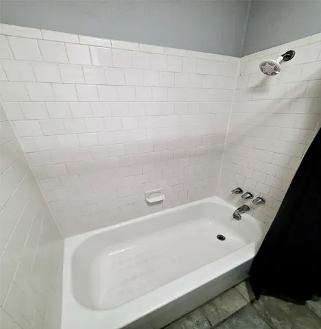a bathroom with a bathtub
