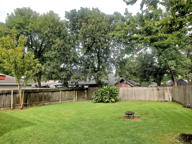 a view of a backyard with a garden