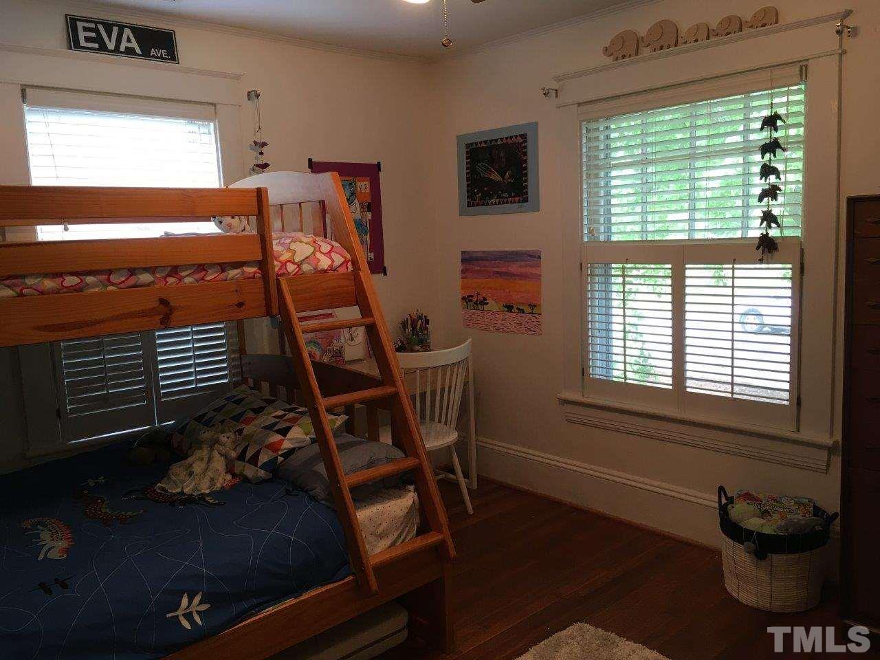 1425 Scales Street Raleigh, NC 27608 - Photo 15 of 25 a view of a livingroom with furniture and a window