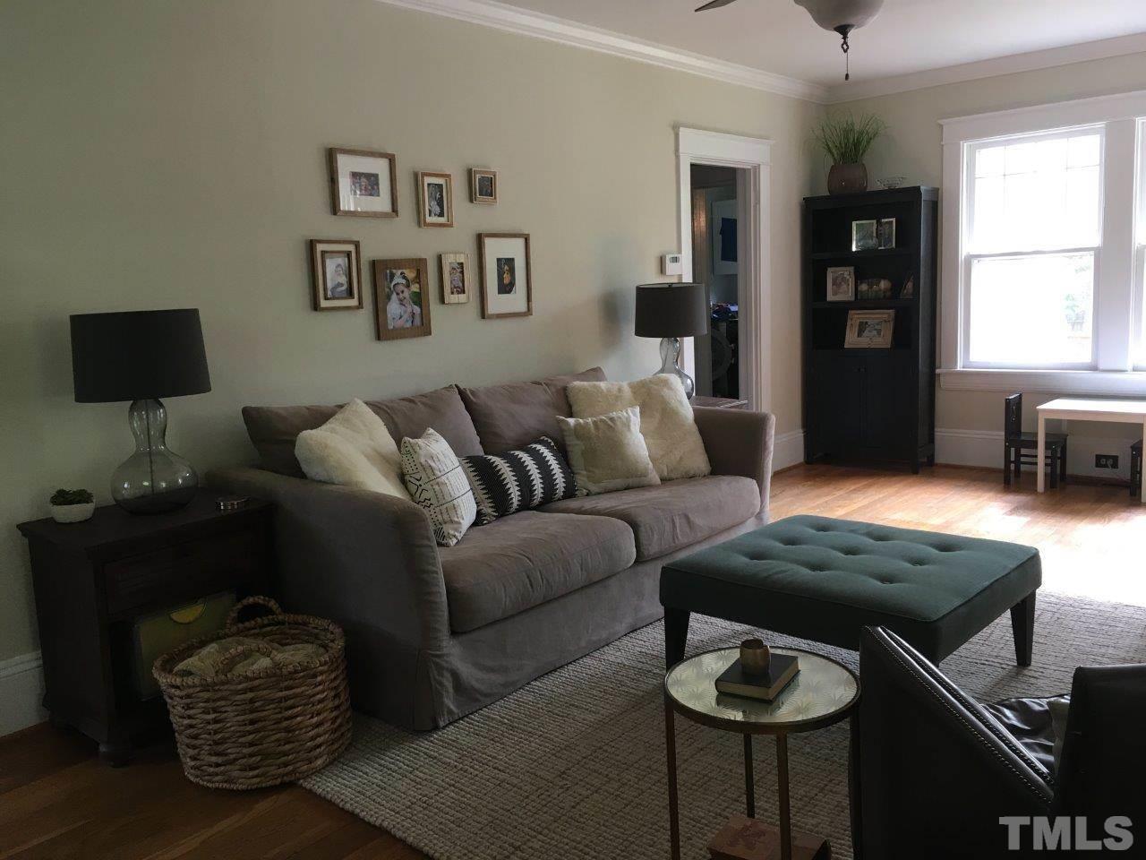 1425 Scales Street Raleigh, NC 27608 - Photo 3 of 25 a living room with furniture and a flat screen tv