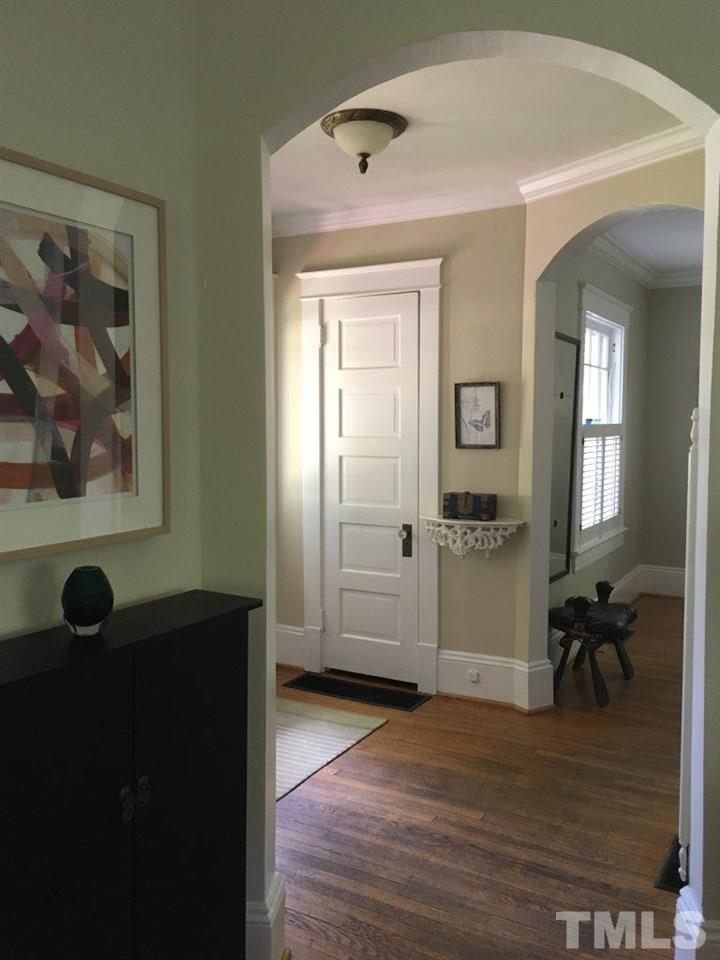 1425 Scales Street Raleigh, NC 27608 - Photo 5 of 25 a view of a hallway view with wooden floor and furniture