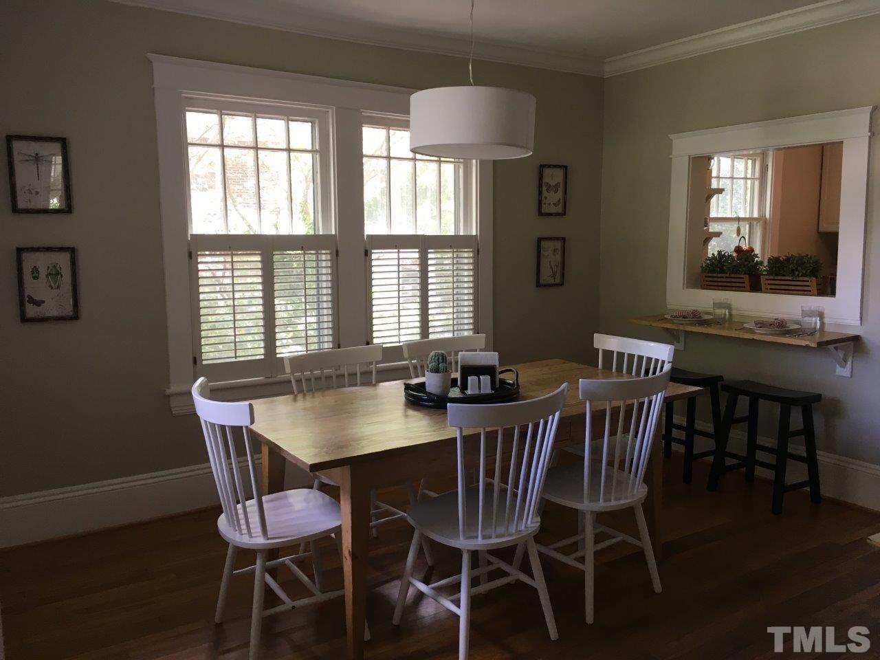 1425 Scales Street Raleigh, NC 27608 - Photo 6 of 25 a view of a dining room with furniture and window