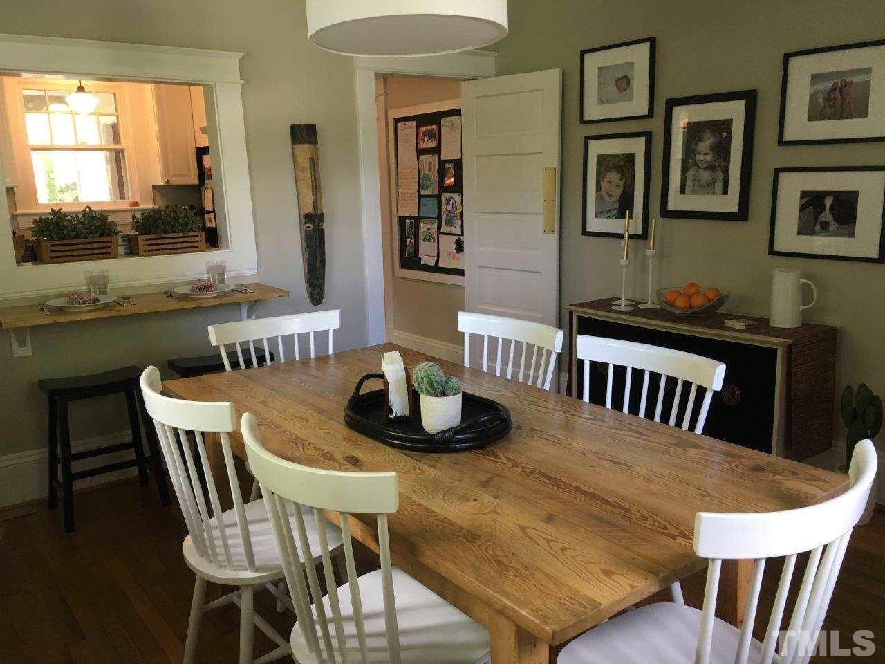 1425 Scales Street Raleigh, NC 27608 - Photo 7 of 25 a view of a dining room with furniture and window