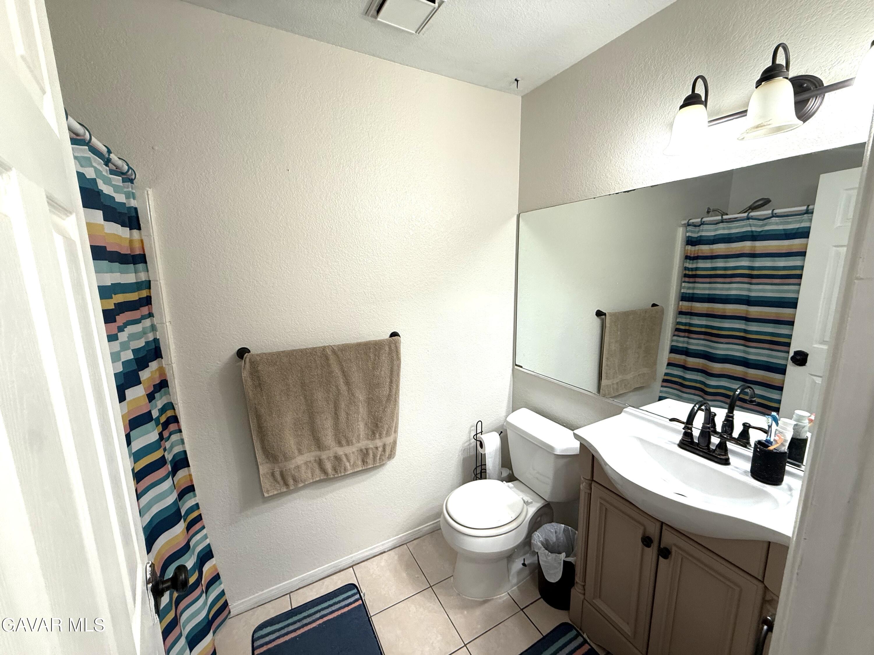 1705 Lightcap Street Lancaster, CA 93535 - Photo 15 of 21 Hall Bathroom