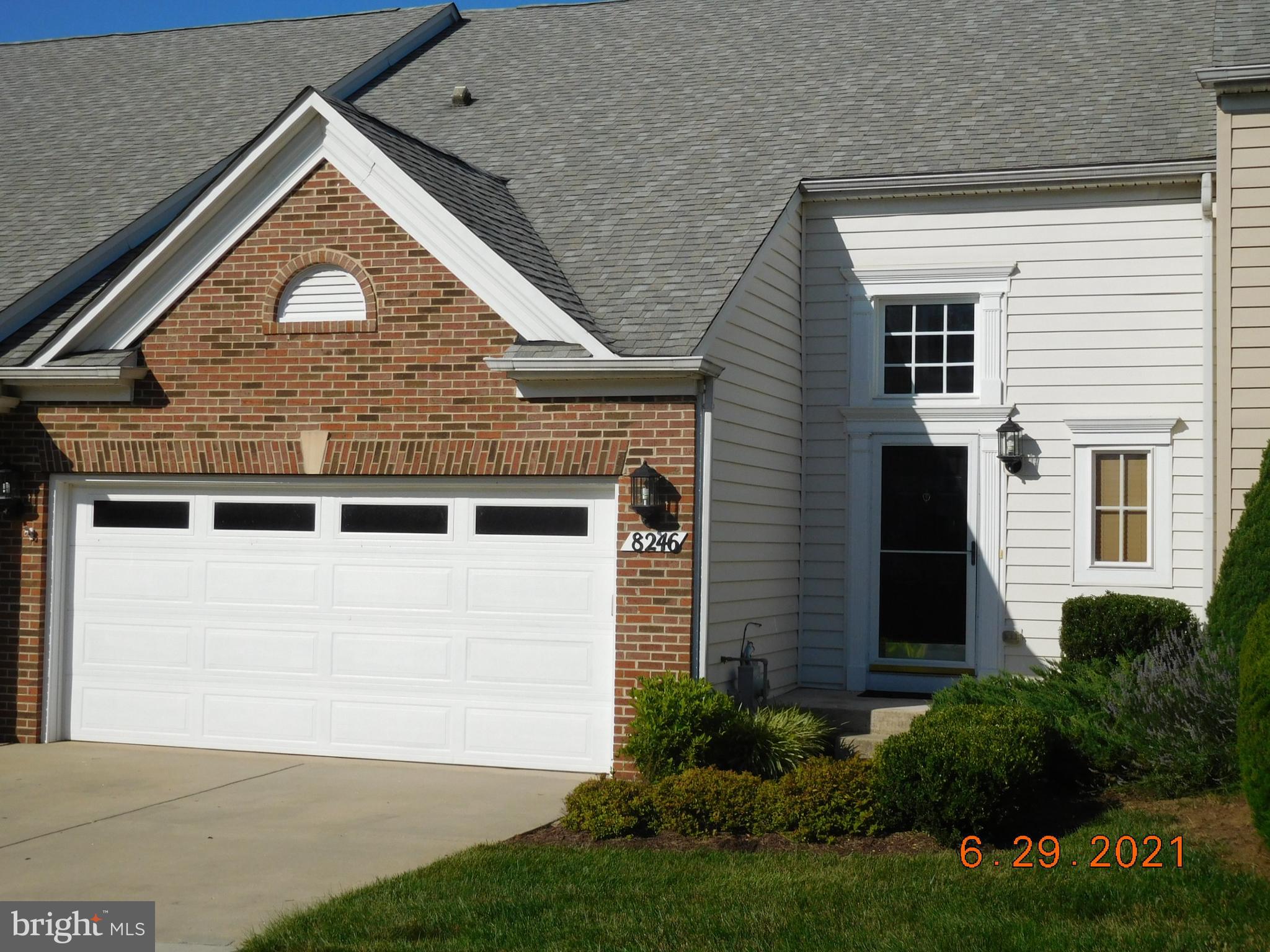 8246 Academy Road Ellicott City, MD 21043 - Photo 1 of 22 Front view of the villa with 2 car garage