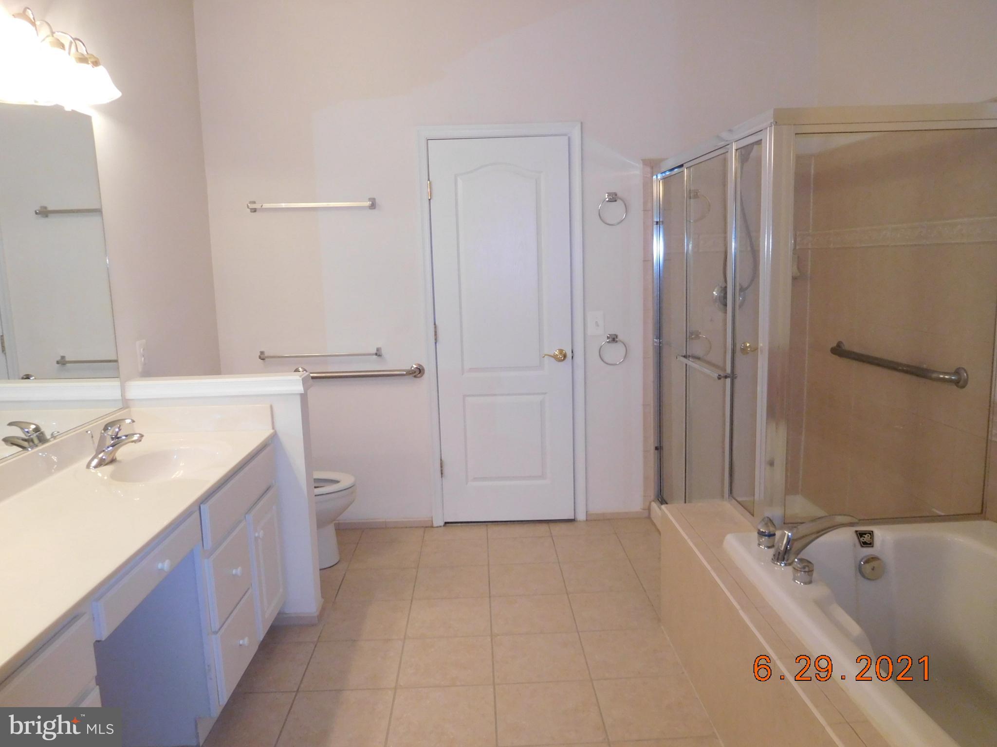 8246 Academy Road Ellicott City, MD 21043 - Photo 11 of 22 Primary bath with soaking tub & separate shower