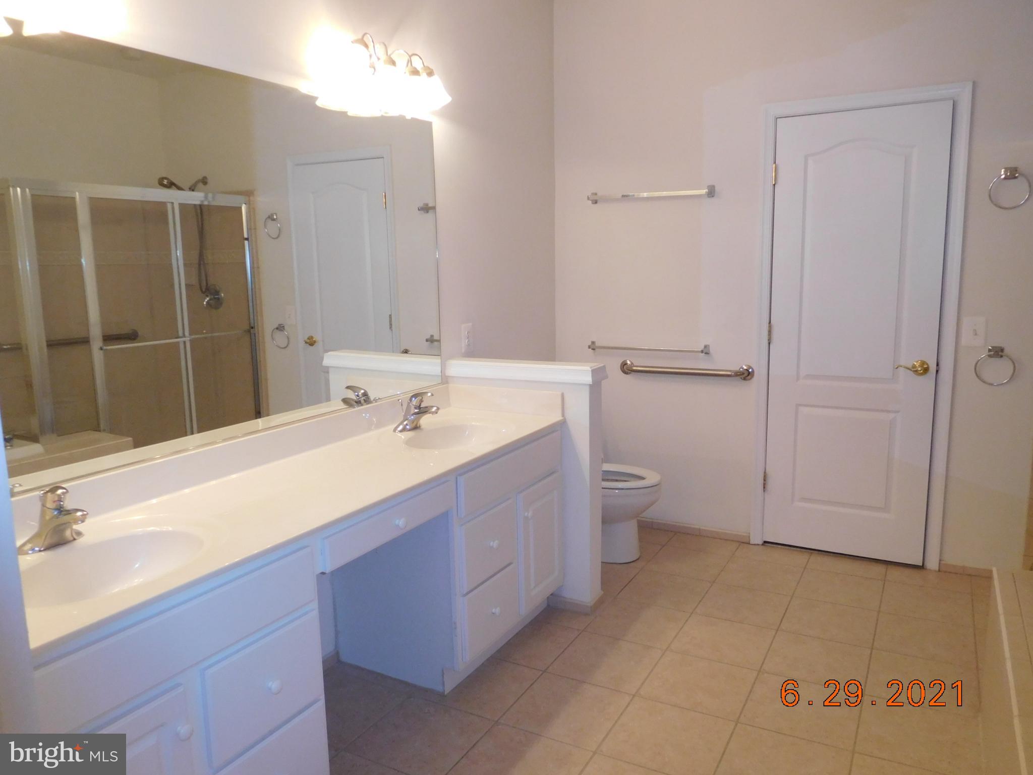 8246 Academy Road Ellicott City, MD 21043 - Photo 12 of 22 Primary bath with double vanity