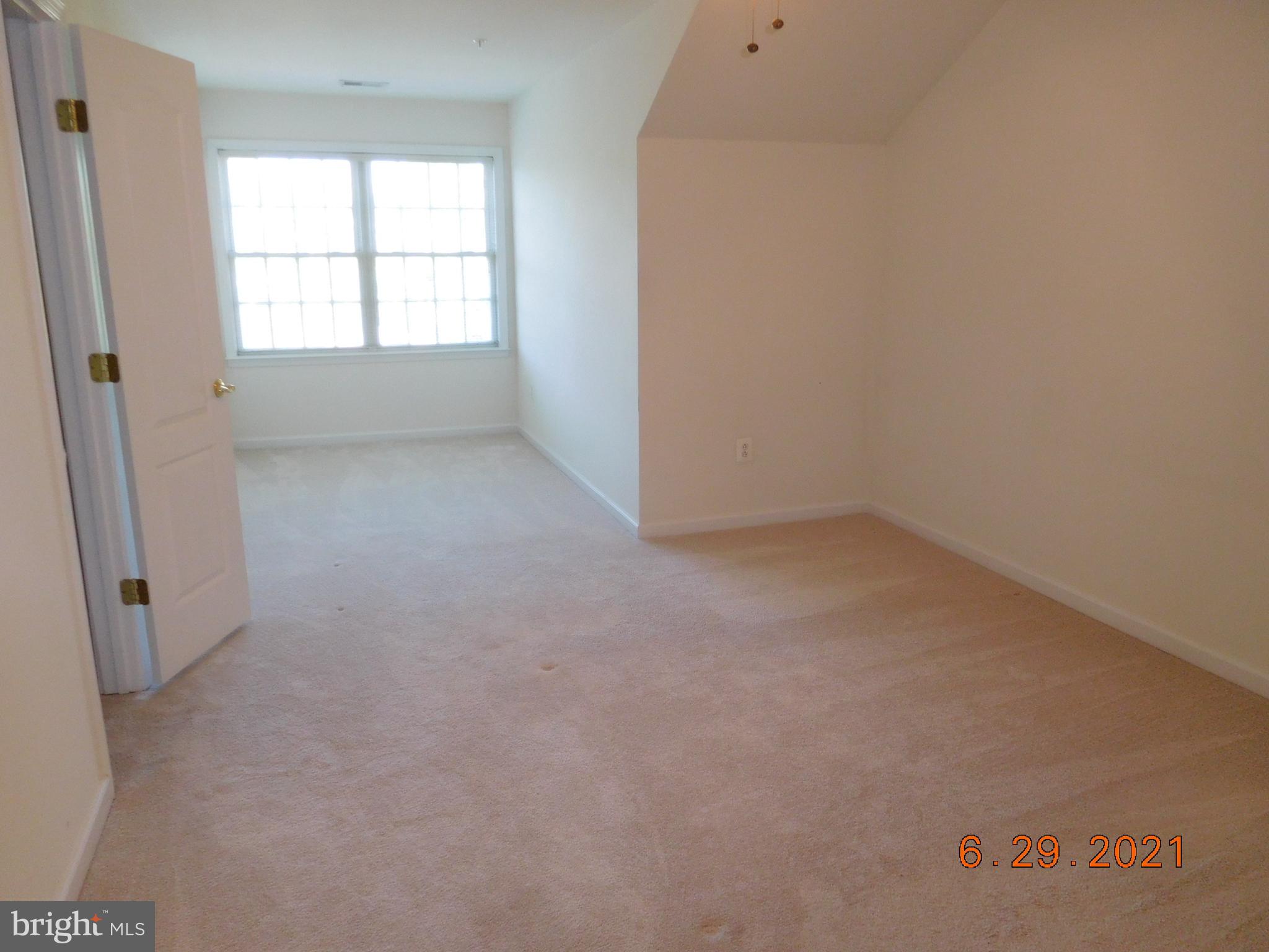 8246 Academy Road Ellicott City, MD 21043 - Photo 13 of 22 Bedroom 2 on the upper level with walk in closet