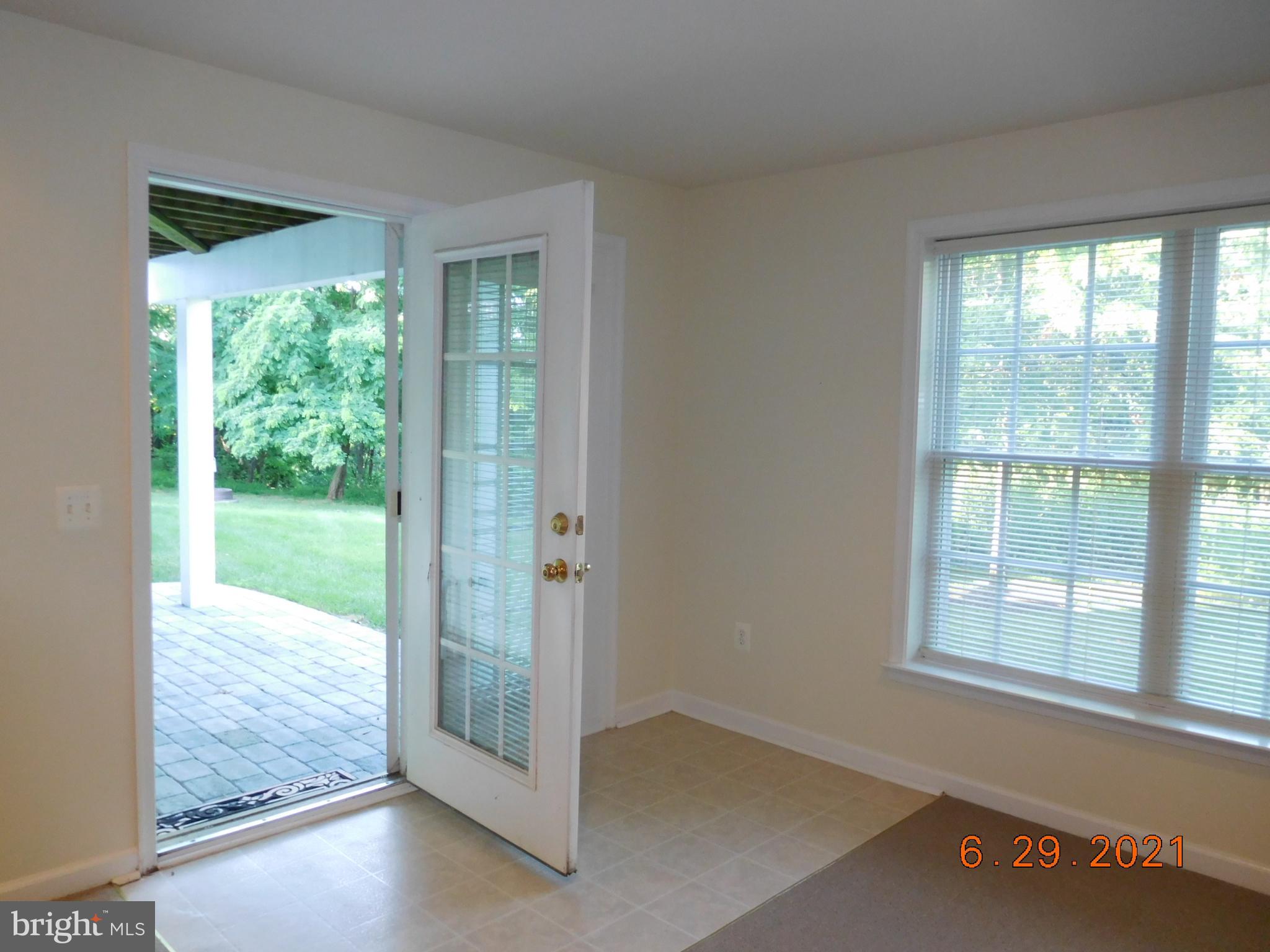 8246 Academy Road Ellicott City, MD 21043 - Photo 18 of 22 View of exit to patio from rec room