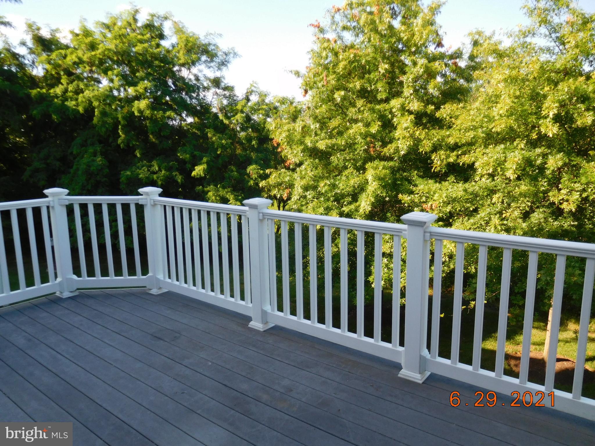 8246 Academy Road Ellicott City, MD 21043 - Photo 21 of 22 Deck with view of trees