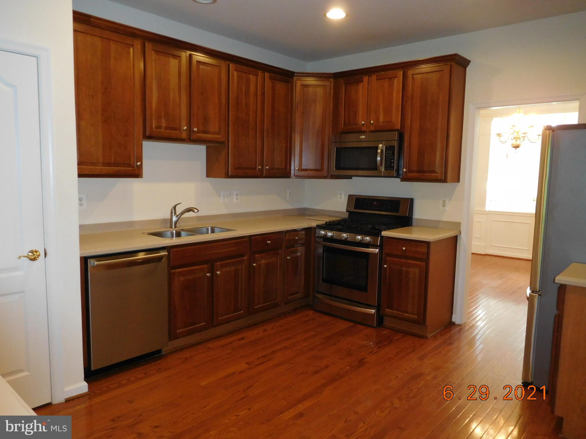 8246 Academy Road Ellicott City, MD 21043 - Photo 4 of 22 kitchen with hardwood flooring