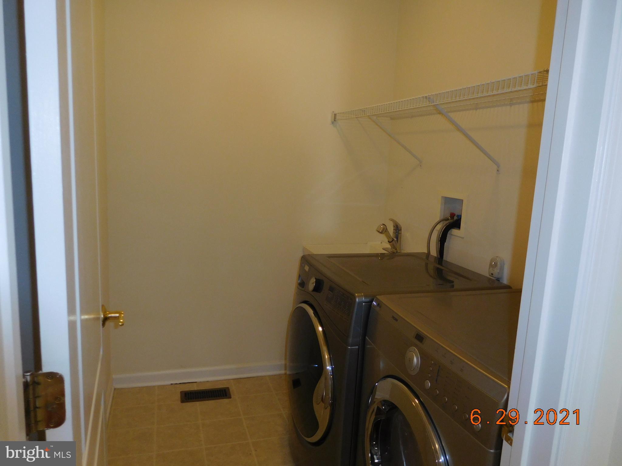 8246 Academy Road Ellicott City, MD 21043 - Photo 7 of 22 Laundry room on main levl