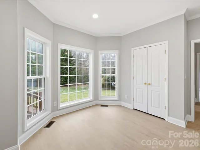 an empty room with windows