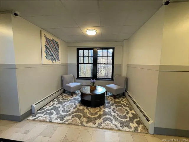 a living room with a couch and a table