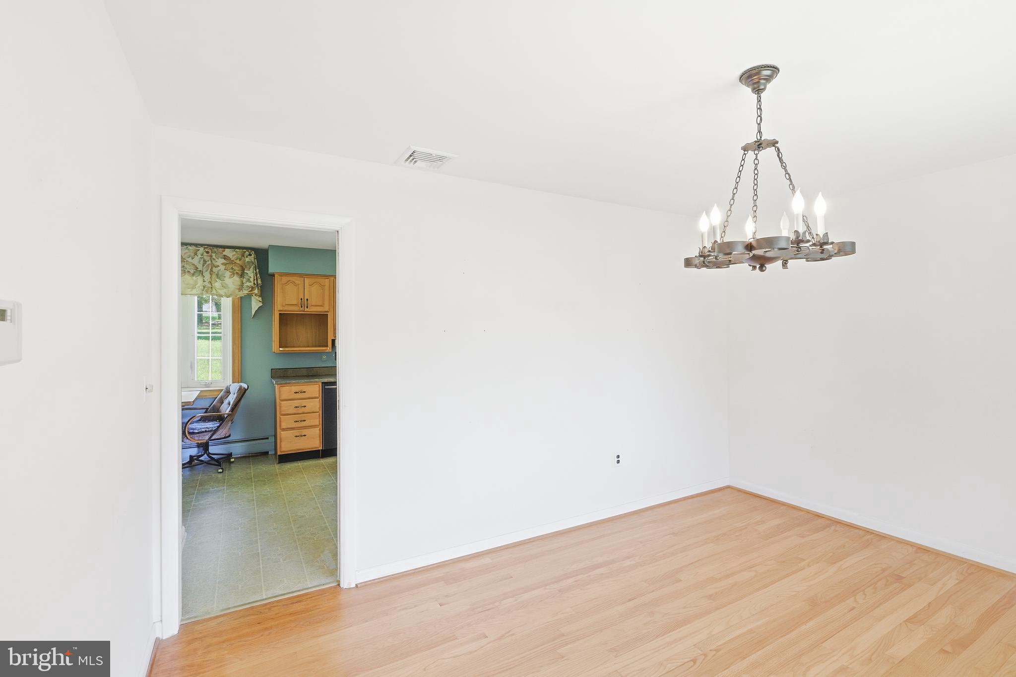 4308 Meadowcliff Road Glen Arm, MD 21057 - Photo 13 of 39 Main Level - formal dining room fits large table