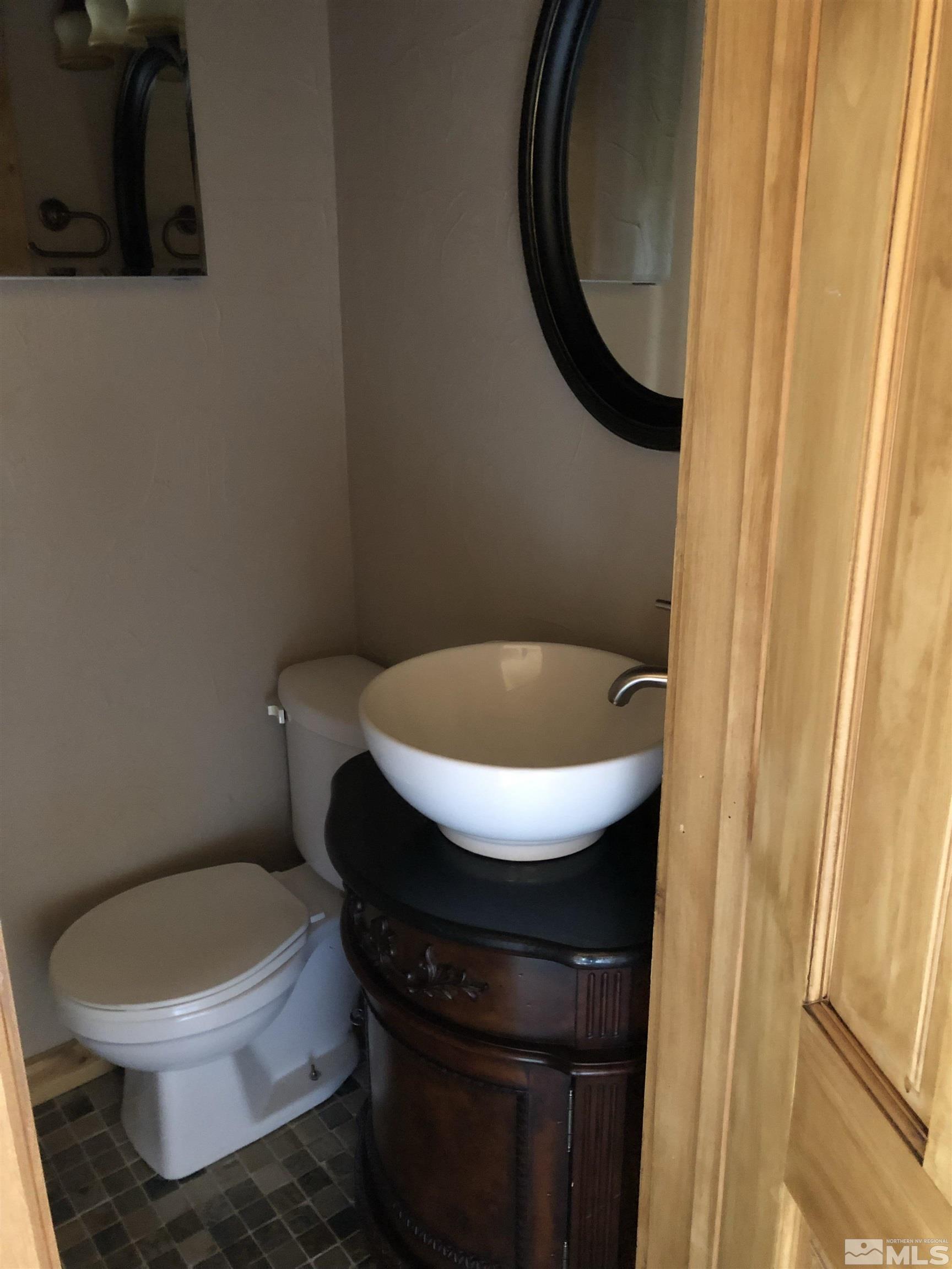 331 Tramway Drive, Unit 20 Stateline, NV 89449 - Photo 19 of 35 a bathroom with a toilet and a sink