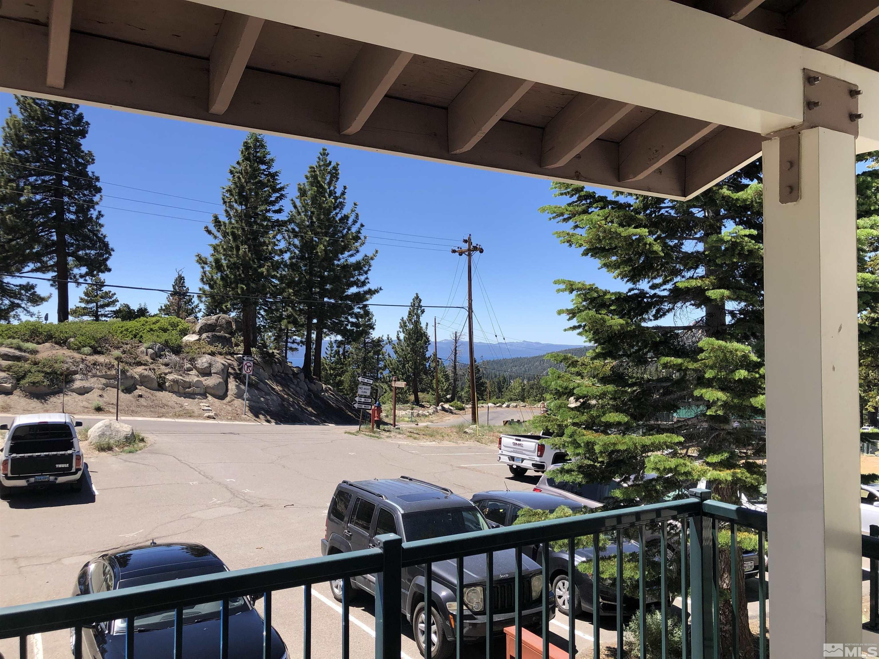 331 Tramway Drive, Unit 20 Stateline, NV 89449 - Photo 24 of 35 a view of a balcony with potted plants