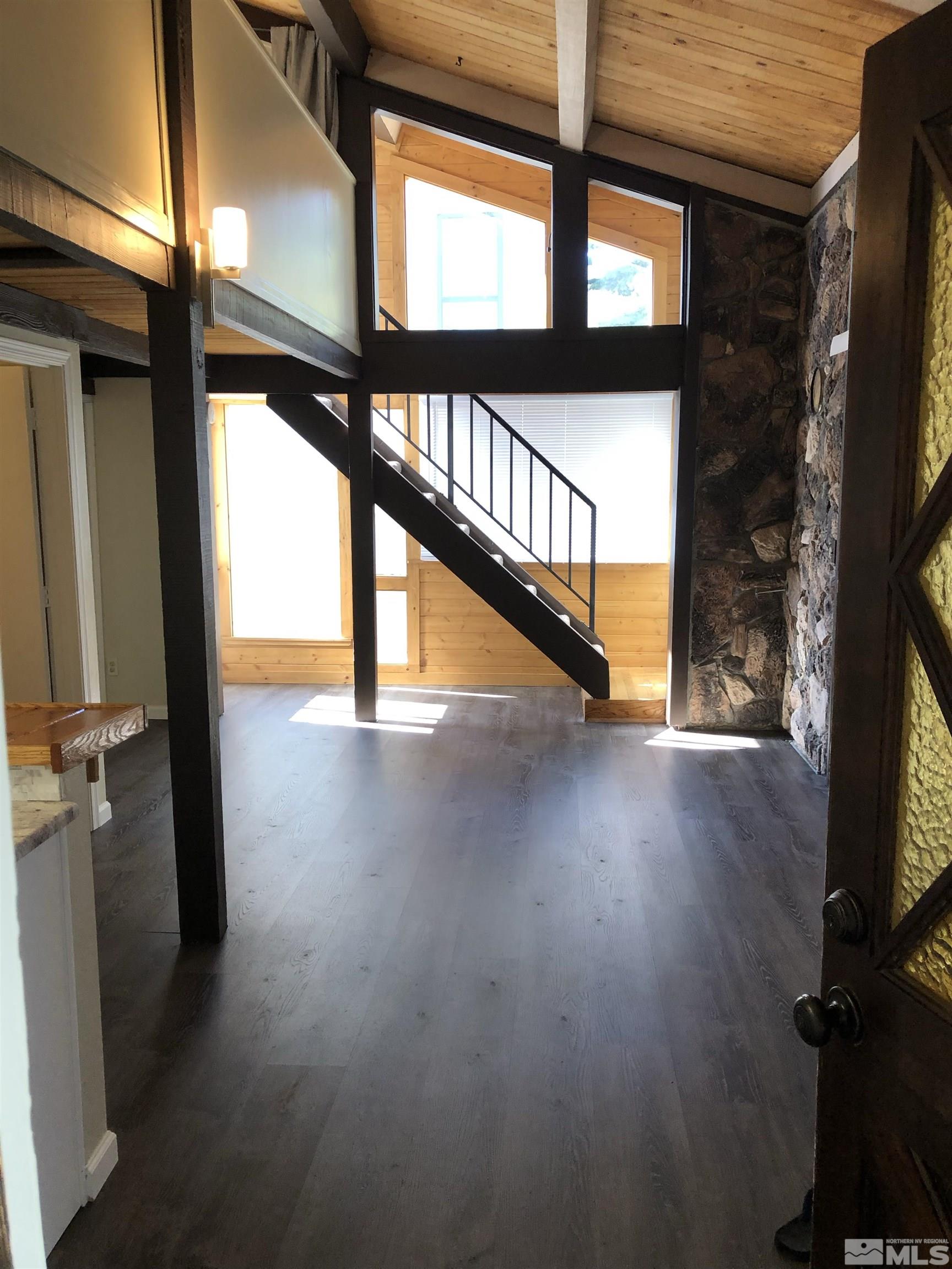 331 Tramway Drive, Unit 20 Stateline, NV 89449 - Photo 7 of 35 a view of an entryway with wooden floor