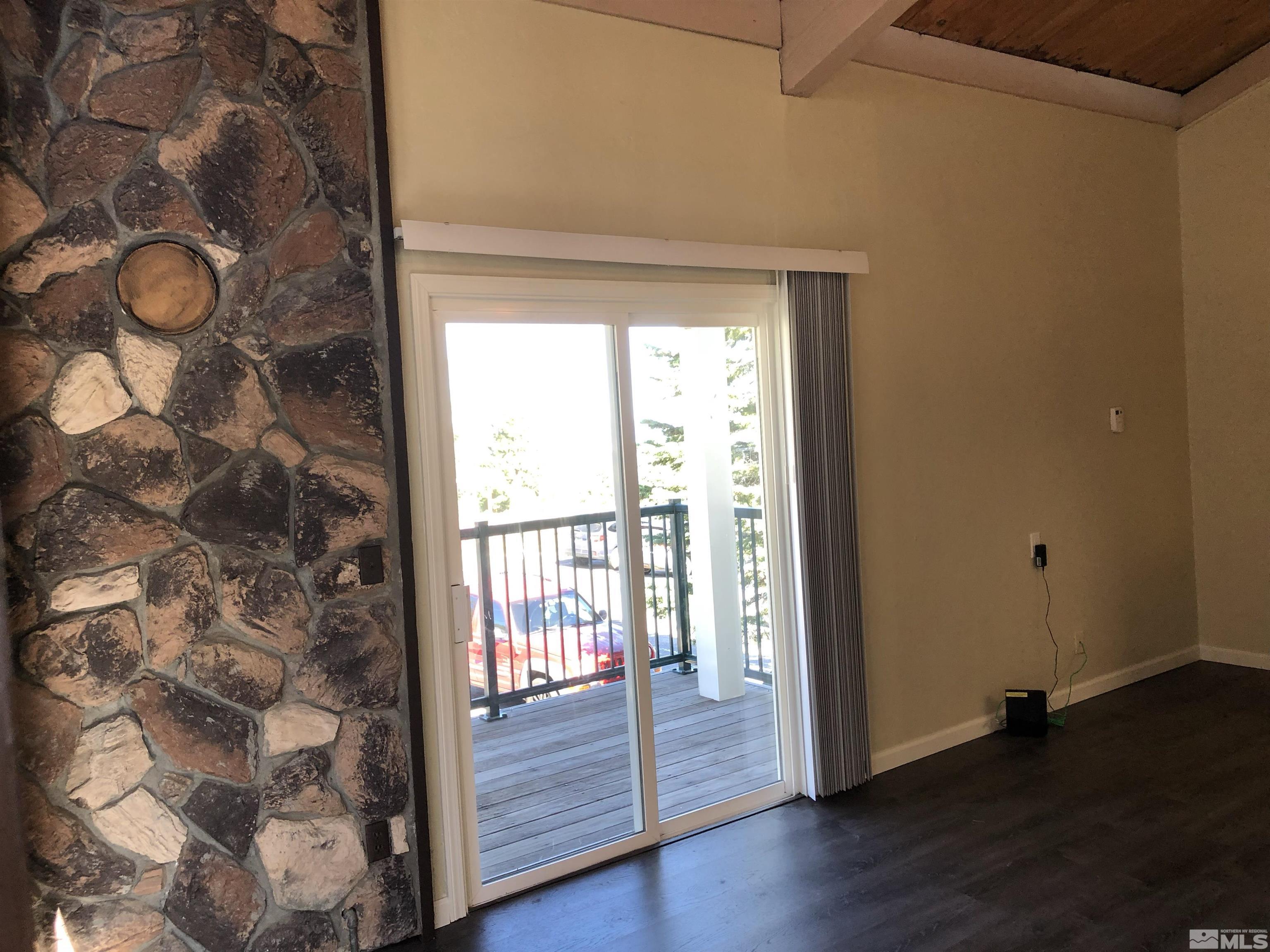 331 Tramway Drive, Unit 20 Stateline, NV 89449 - Photo 10 of 35 a view of entryway with wooden floor