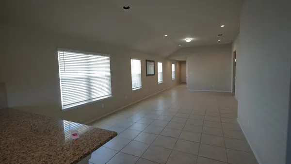 en empty room with windows