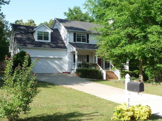 364 N Ridge Senoia, GA 30276 - Photo 1 of 1 a view of a house with backyard and sitting area