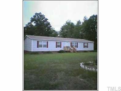 3112 Prophecy Road Middlesex, NC 27557 - Photo 1 of 1 a view of a house with a backyard
