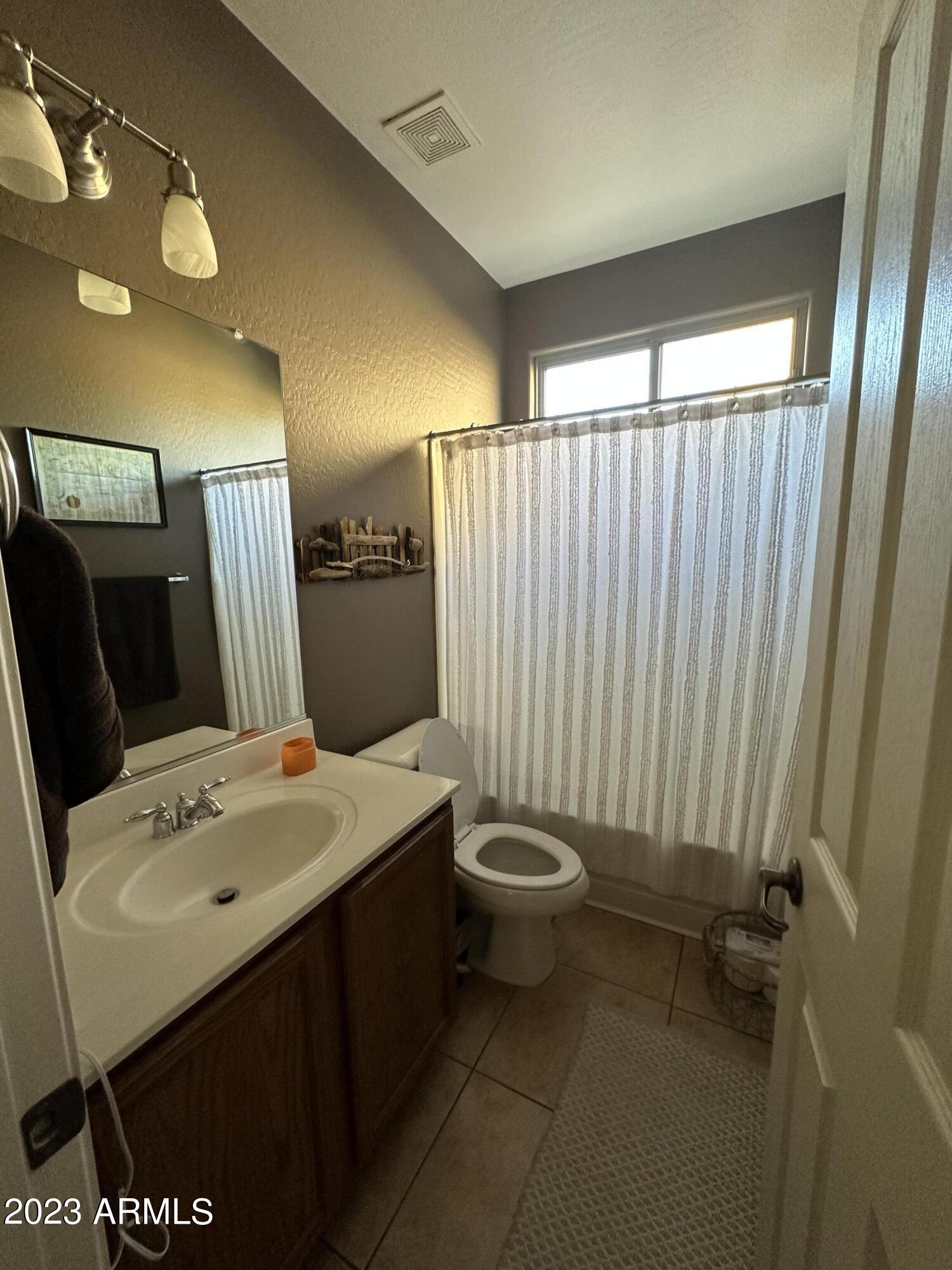 6864 West Ridgeline Road Peoria, AZ 85383 - Photo 17 of 44 full bath downstairs
