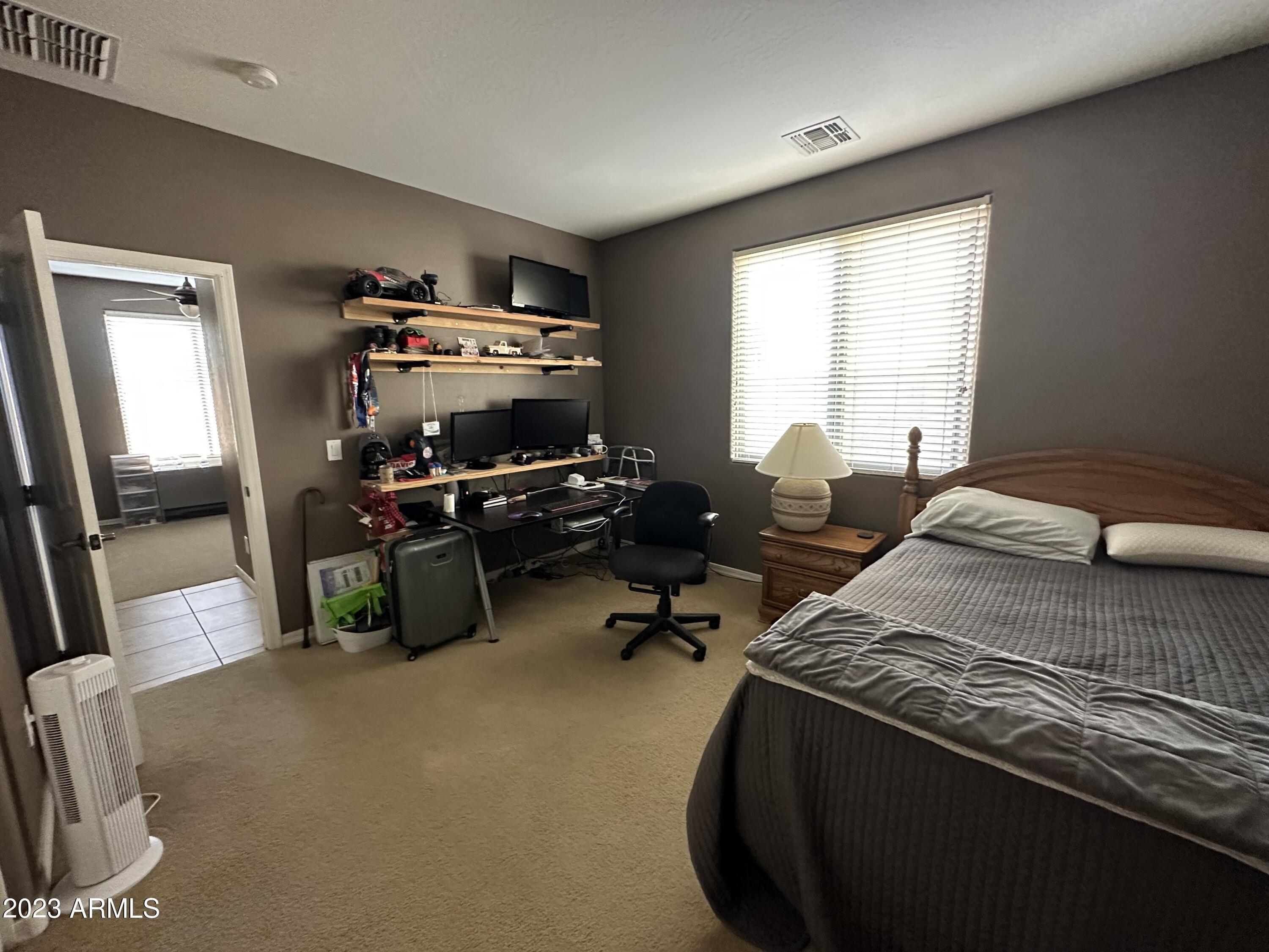 6864 West Ridgeline Road Peoria, AZ 85383 - Photo 18 of 44 5th bedroom downstairs