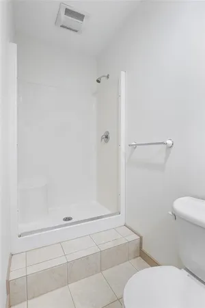 an empty room with a bathroom