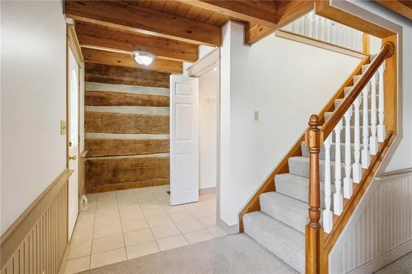 a view of entryway with stairs