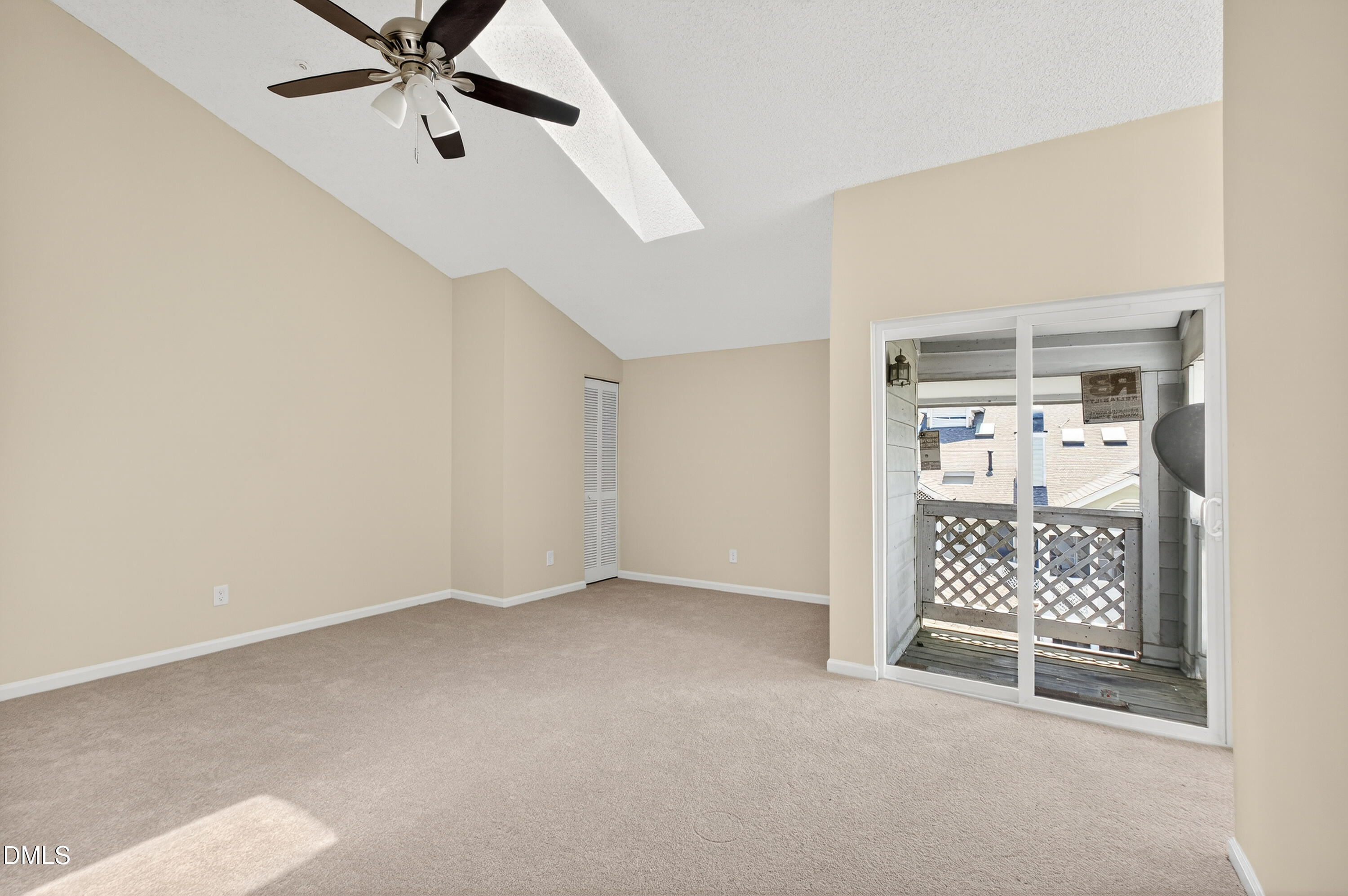 4921 Hollenden Drive, Unit 303 Raleigh, NC 27616 - Photo 16 of 33 an empty room with windows