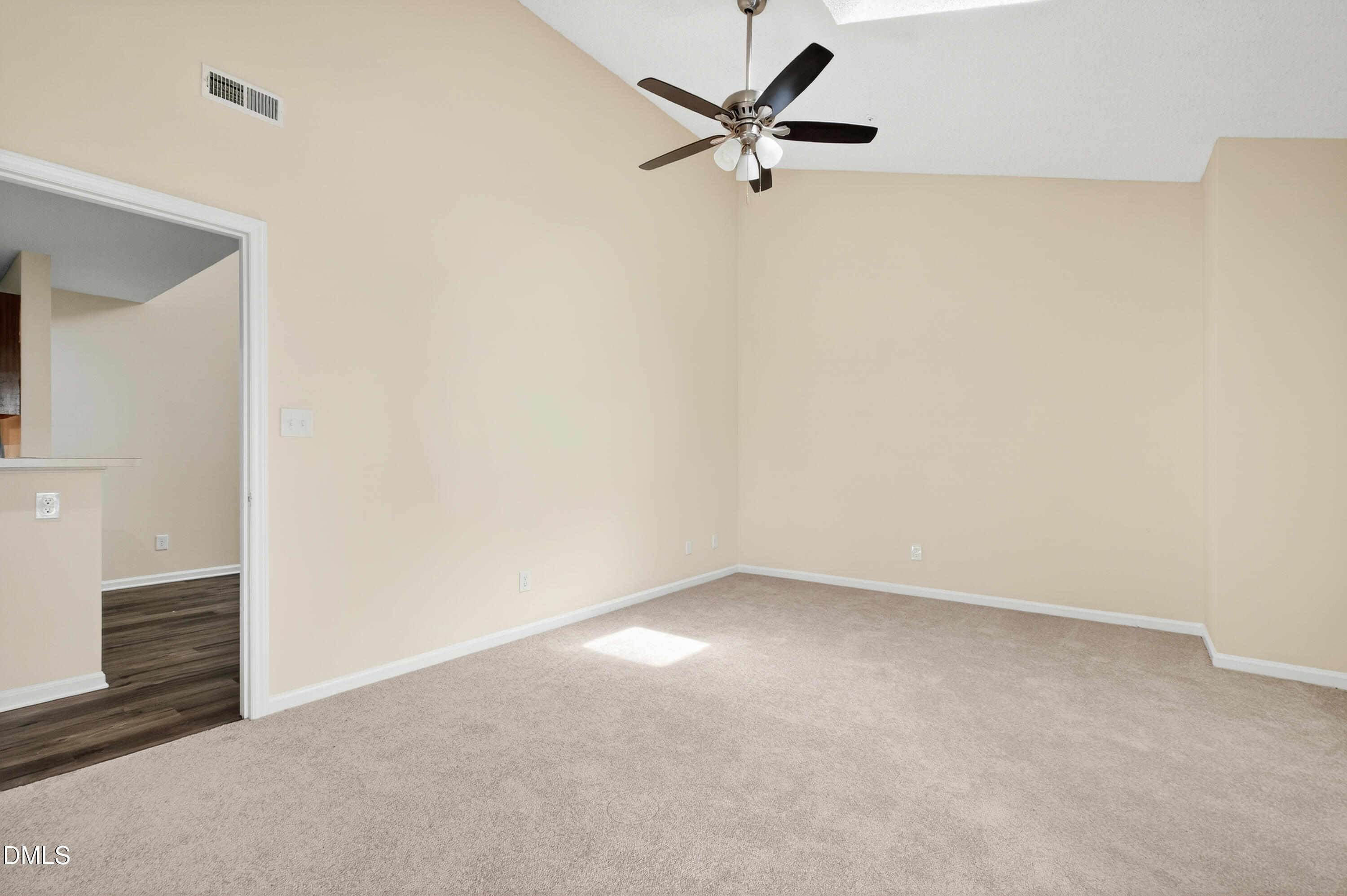 4921 Hollenden Drive, Unit 303 Raleigh, NC 27616 - Photo 19 of 33 a view of an empty room with a window