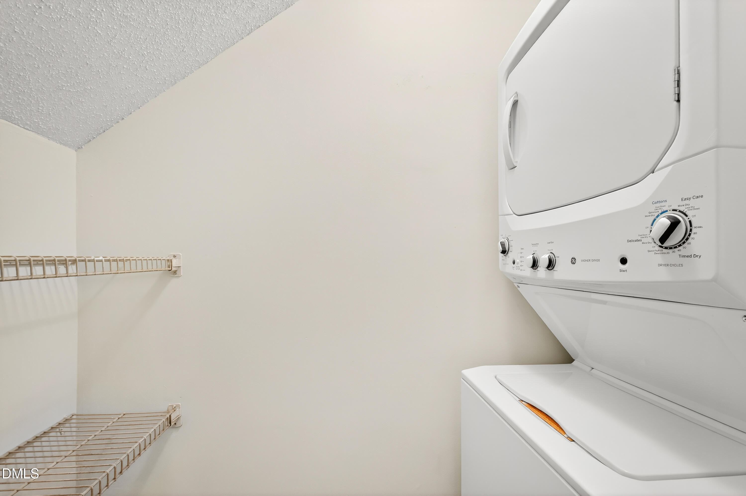 4921 Hollenden Drive, Unit 303 Raleigh, NC 27616 - Photo 24 of 33 a white toilet sitting next to a shower