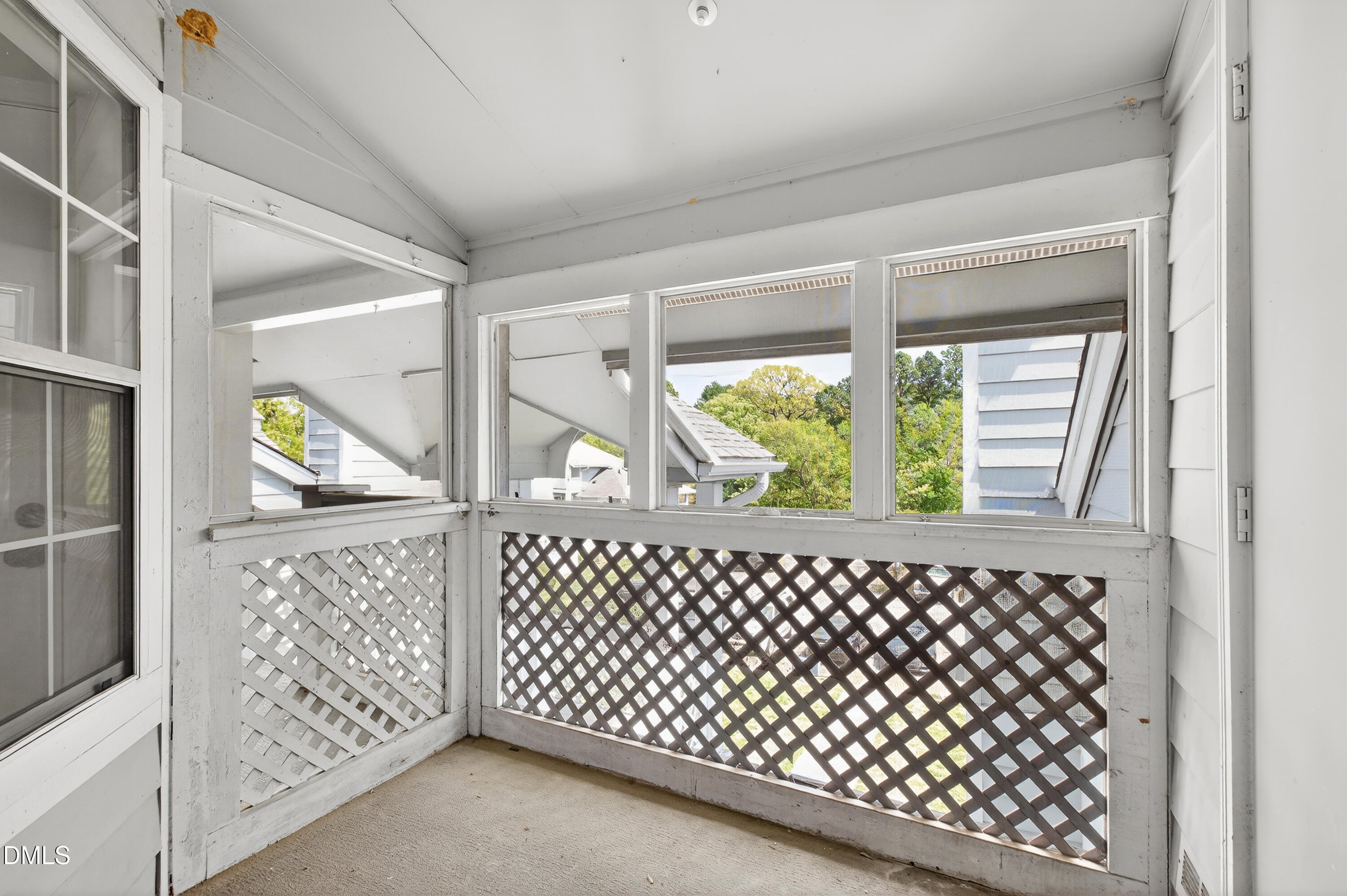 4921 Hollenden Drive, Unit 303 Raleigh, NC 27616 - Photo 31 of 33 a view of a porch