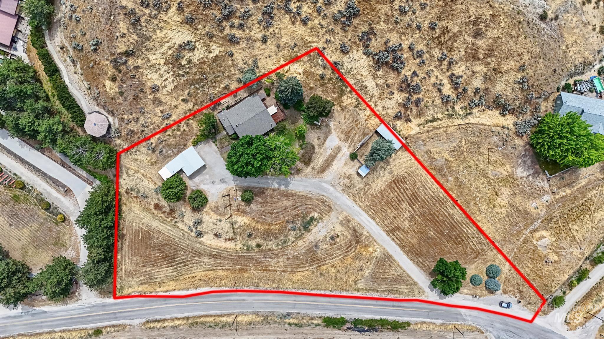 4311 Frozen Dog Road Emmett, ID 83617 - Photo 13 of 31 Expansive property featuring a single-family residence, outbuilding, and significant undeveloped land