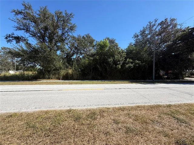 a view of swimming pool with an outdoor space and seating area