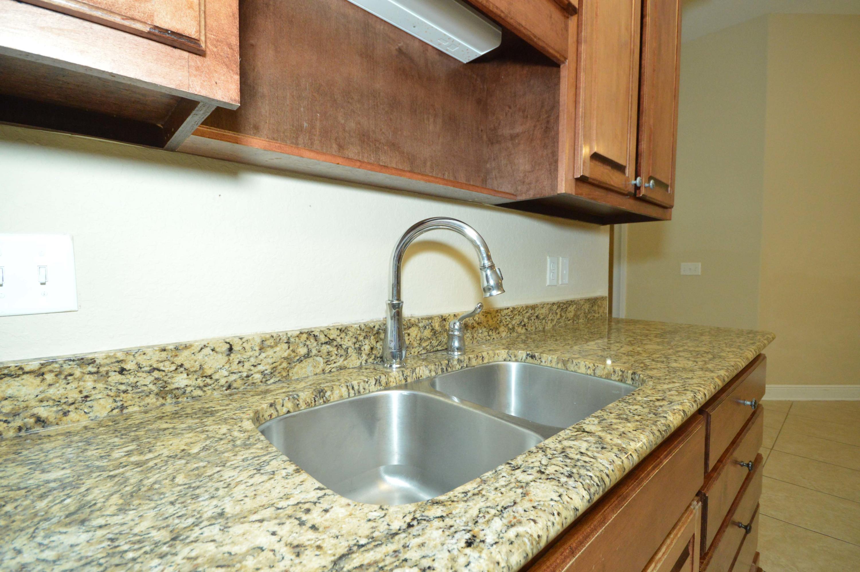 9970 Nichols Lake Road Milton, FL 32583 - Photo 20 of 48 a close view of sink and tap