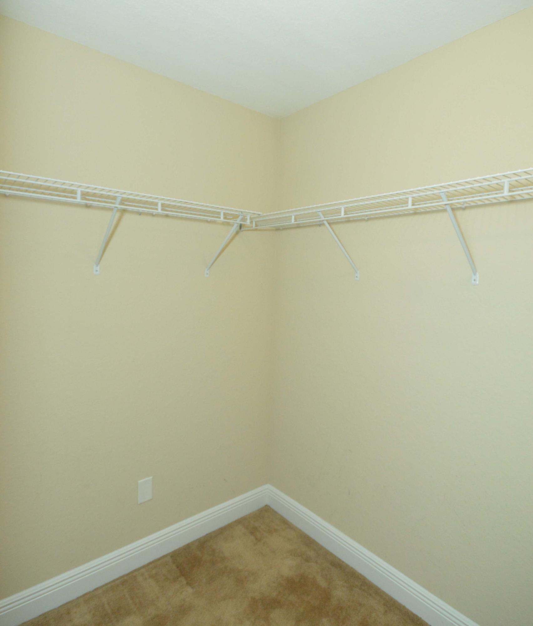 9970 Nichols Lake Road Milton, FL 32583 - Photo 42 of 48 a view of a room with racks on the wall