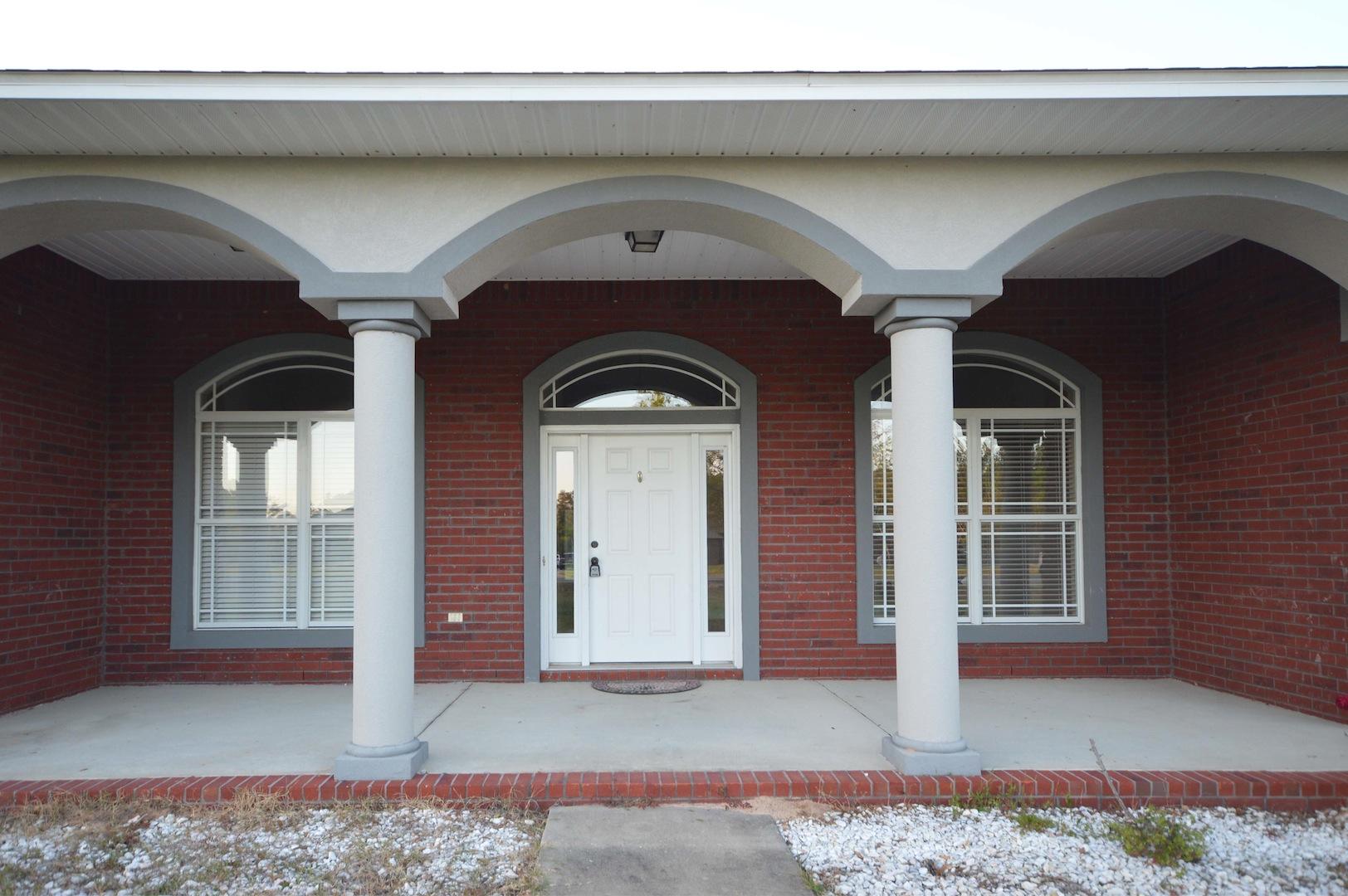 9970 Nichols Lake Road Milton, FL 32583 - Photo 6 of 48 a view of front door