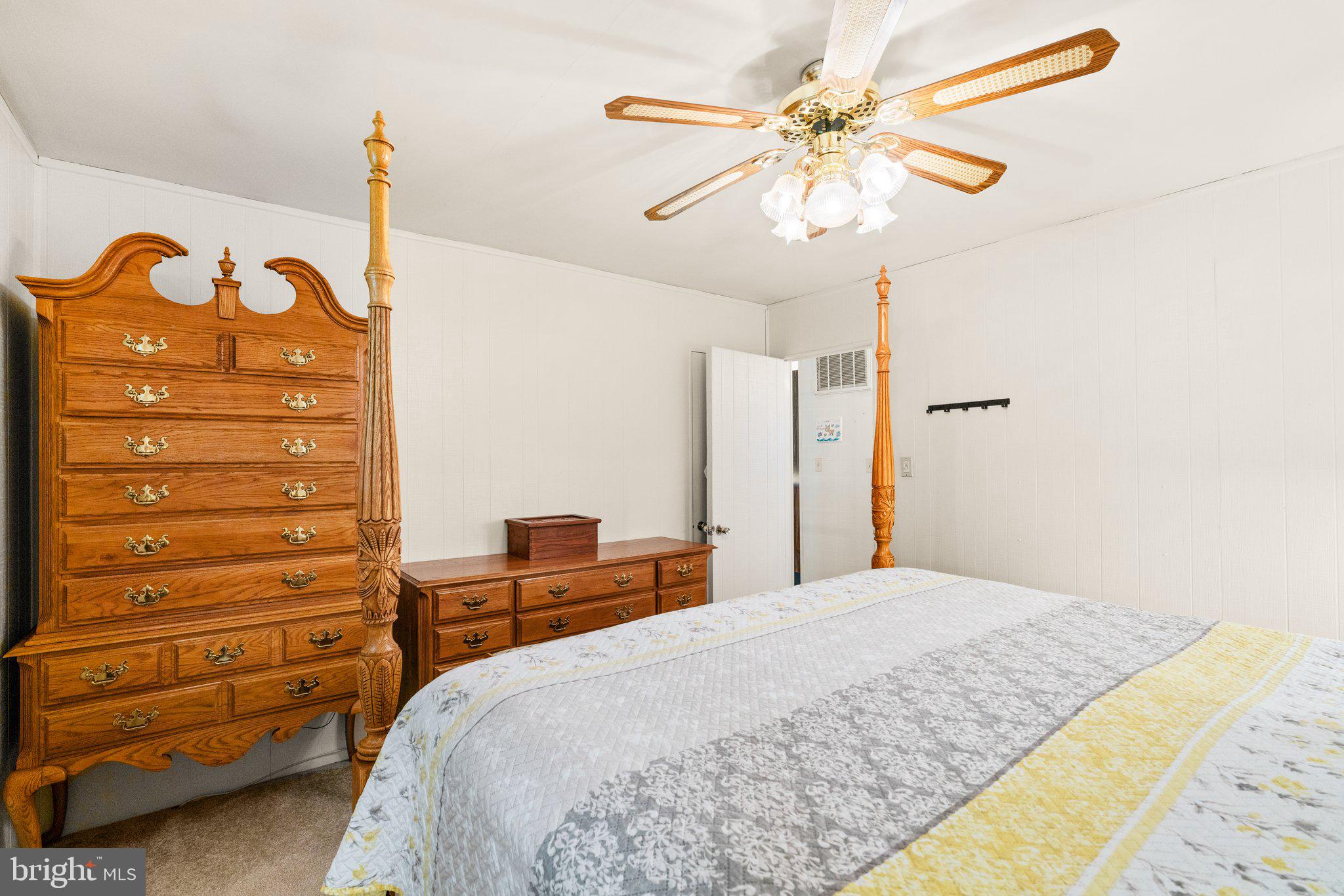 1814 Tyler Road Dundalk, MD 21222 - Photo 12 of 30 a bedroom with a bed and a chandelier