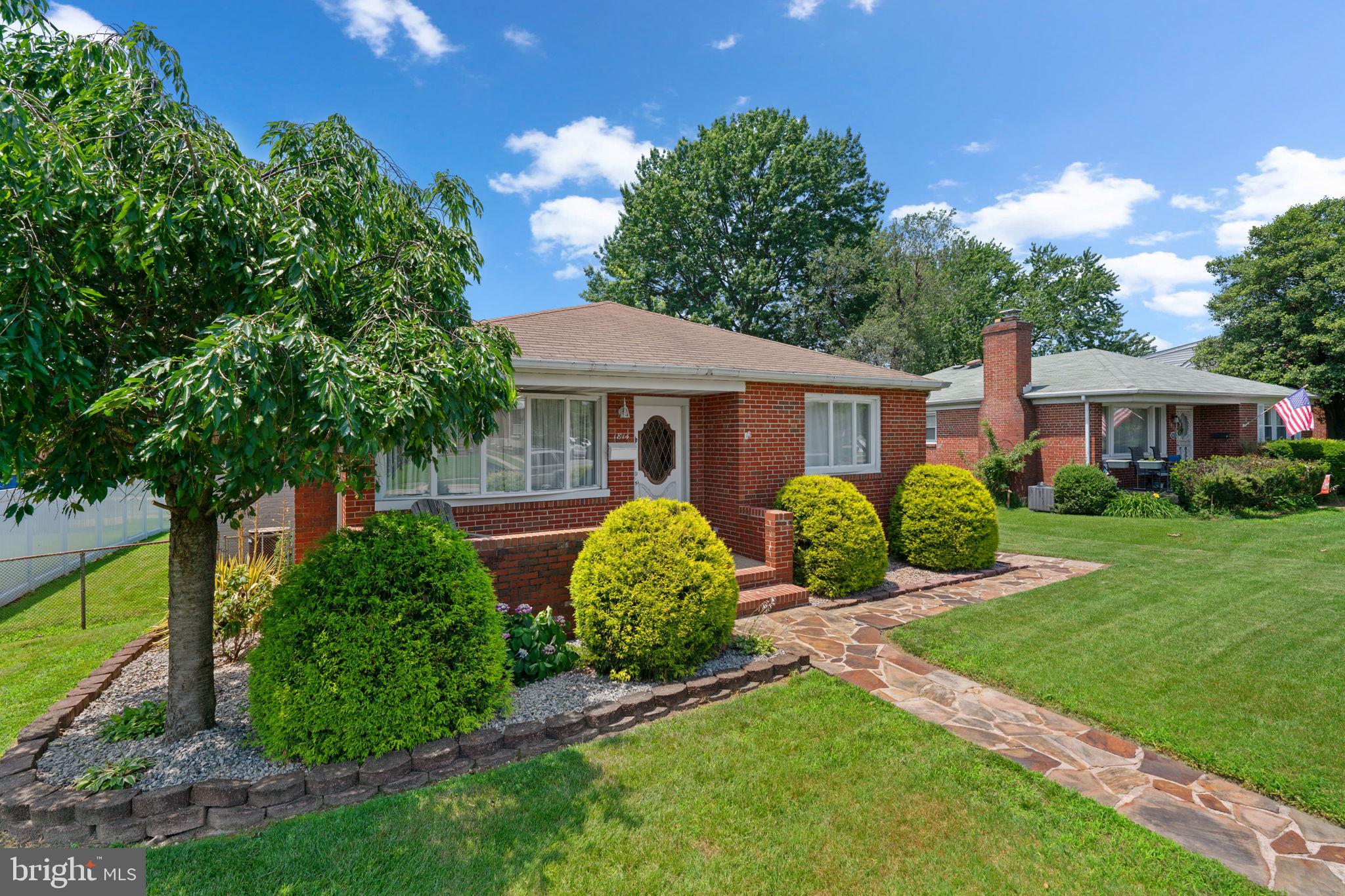 1814 Tyler Road Dundalk, MD 21222 - Photo 24 of 30 a front view of a house with a yard