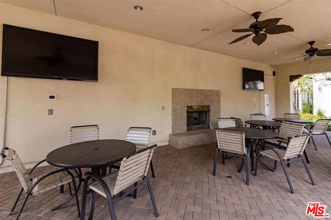 20427 Paseo Azul Porter Ranch, CA 91326 - Photo 12 of 38 a view of a livingroom with furniture and a flat screen tv