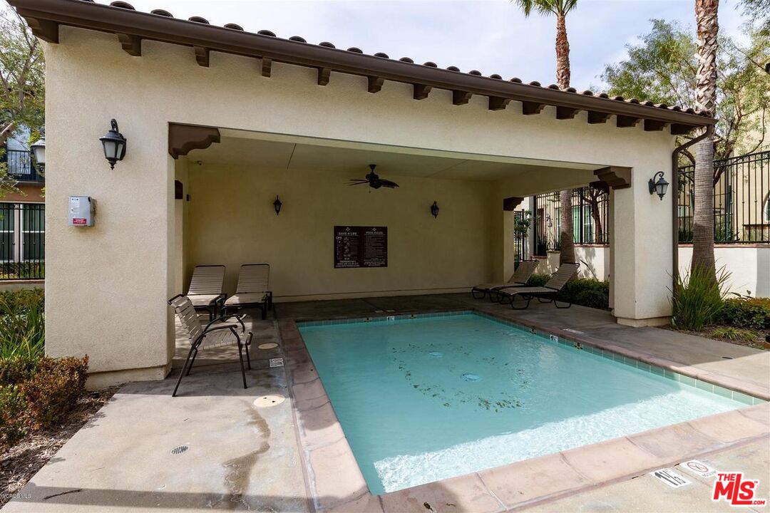 20427 Paseo Azul Porter Ranch, CA 91326 - Photo 13 of 38 a view of a patio with a table and chairs