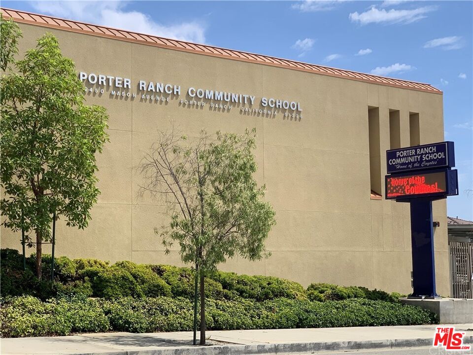 20427 Paseo Azul Porter Ranch, CA 91326 - Photo 15 of 38 a sign on the side of a building