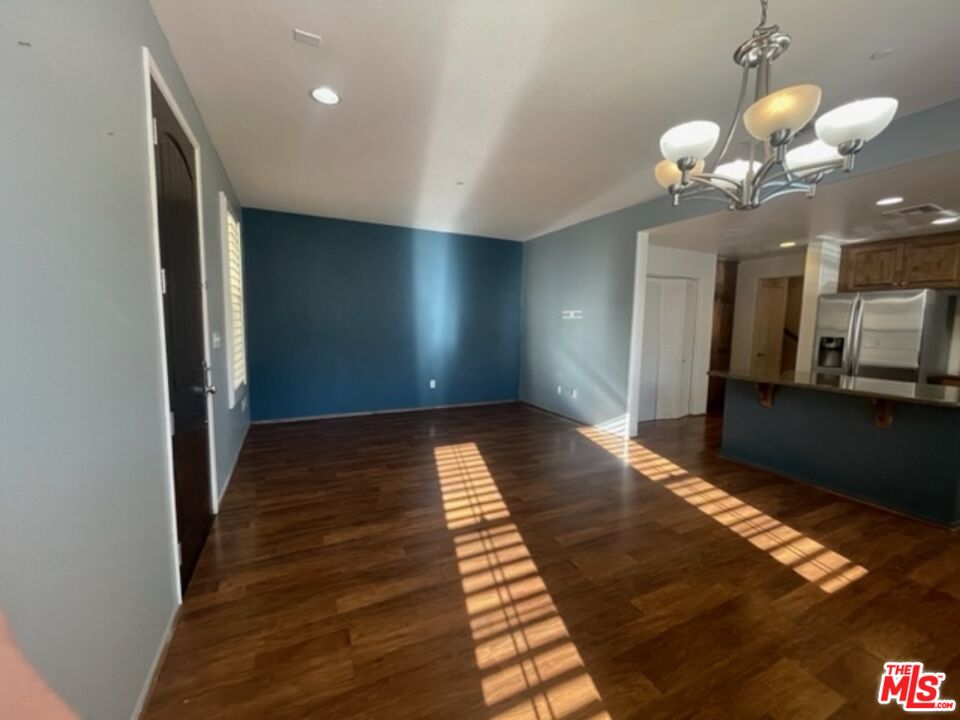 20427 Paseo Azul Porter Ranch, CA 91326 - Photo 20 of 38 a view of a hallway with wooden floor