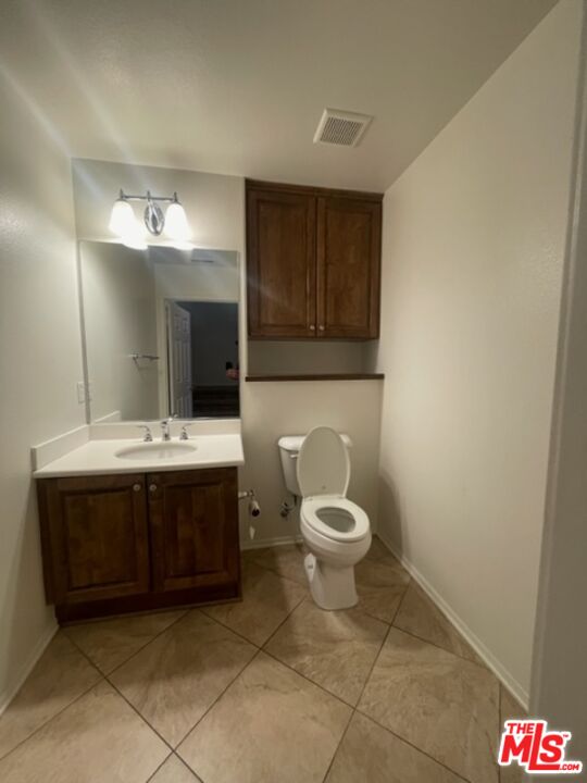 20427 Paseo Azul Porter Ranch, CA 91326 - Photo 25 of 38 a bathroom with a sink and a mirror