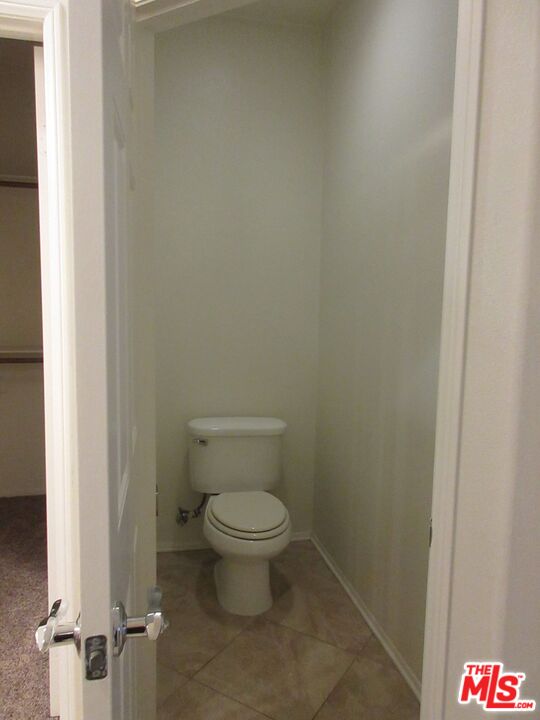 20427 Paseo Azul Porter Ranch, CA 91326 - Photo 32 of 38 a bathroom with a toilet