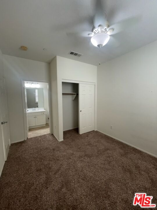 20427 Paseo Azul Porter Ranch, CA 91326 - Photo 36 of 38 wooden floor in an empty room with a bathroom