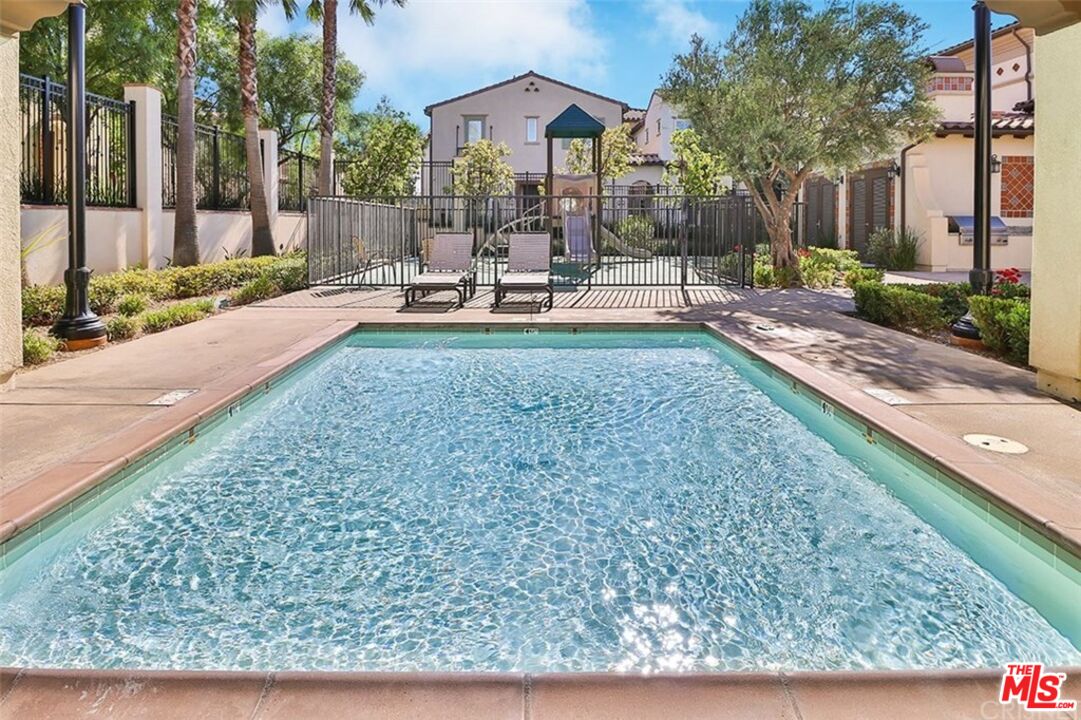 20427 Paseo Azul Porter Ranch, CA 91326 - Photo 5 of 38 a garden view with a seating space