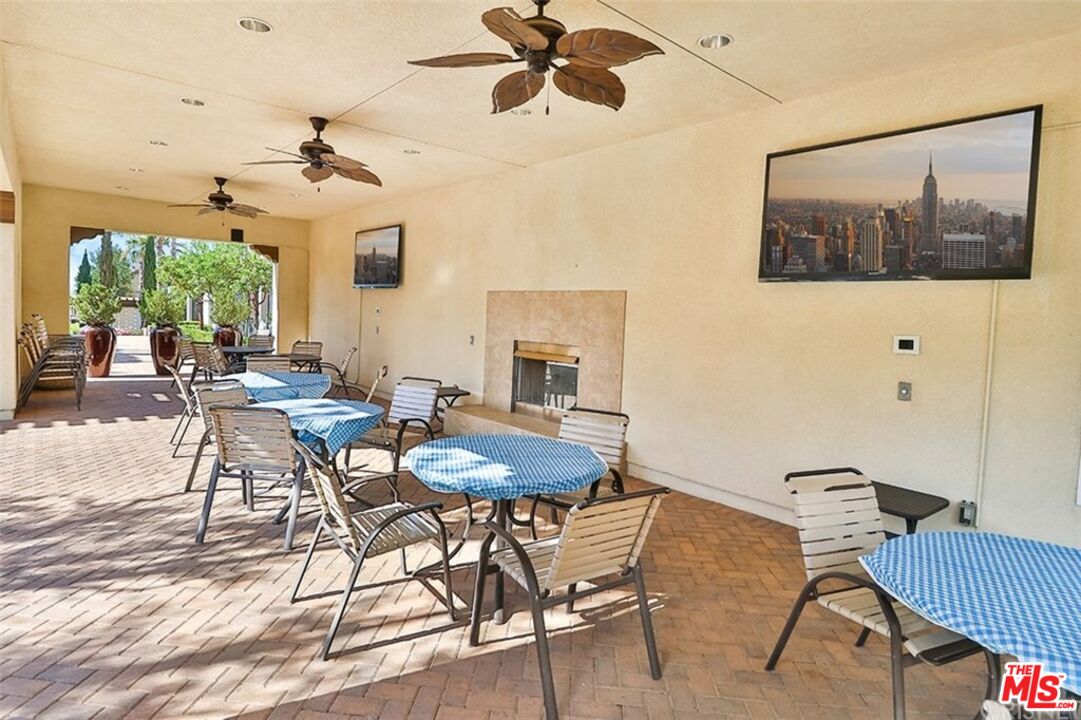 20427 Paseo Azul Porter Ranch, CA 91326 - Photo 7 of 38 a view of a dining room with furniture window and wooden floor